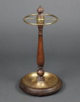 An Edwardian turned mahogany and gilt metal umbrella/stick stand 64cm h x 32cm diam. Contact marks