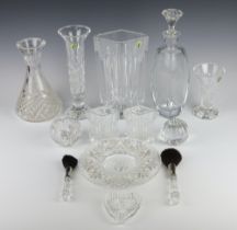 A Waterford Crystal vase of diamond form 25cm, a ditto flared neck vase 28cm, a balloon shaped ditto