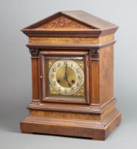 Junghans, an Edwardian Ting Tang bracket clock, having a square gilt dial with silvered chapter
