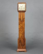 The Perivale Clock Company, a 1930's Art Deco chiming granddaughter clock with 17cm square