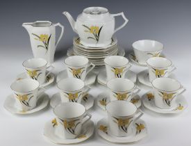 An Art Deco Czechoslovakian tea set decorated with stylised flowers comprising 10 tea cups (3 a/