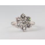 A white metal 18ct 7 stone diamond cluster ring, size K, 4.7 grams, approx. 2.2ct, colour F/G,