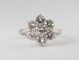 A white metal 18ct 7 stone diamond cluster ring, size K, 4.7 grams, approx. 2.2ct, colour F/G,
