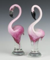 A near pair of Murano pink glass figures of Flamingo on clear stems 28cm