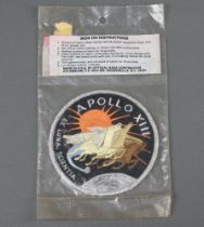 An American Apollo XIII souvenir space embroidered badge, in original packaging, 9cm