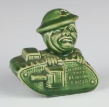 A First World War green glazed money bank in the form of a tank "Where's That Blinkin Kaiser" 9cm