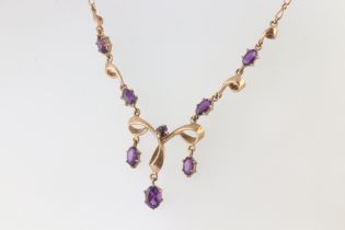A 9ct yellow gold amethyst pendant on a 9ct yellow gold 36cm chain, 4.6 grams