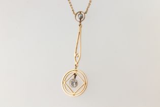 A yellow metal 15ct diamond set pendant approx. 0.28ct, on a ditto chain 42cm, gross weight 3.6