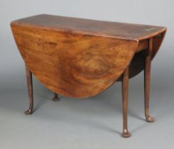 A Georgian oval mahogany drop flap dining table raised on pad feet 73cm h x 115cm x 38cm The top