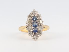 A yellow metal Edwardian sapphire and diamond marquise ring, size N 1/2, 6.2 grams