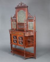 A Victorian carved walnut chiffonier sideboard, the raised back fitted 3 plate mirrors above a