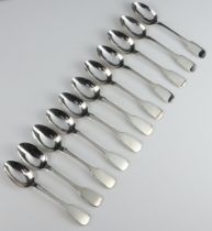 Eleven Victorian silver Old English pattern dessert spoons Dublin 1863 and 1865, maker JS, 261 grams