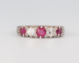 A white metal 3 stone ruby and 2 stone diamond ring, rubies approx. 0.50ct, the diamonds approx. 0.