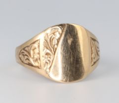A 9ct yellow gold engraved signet ring size T, 3.3 grams
