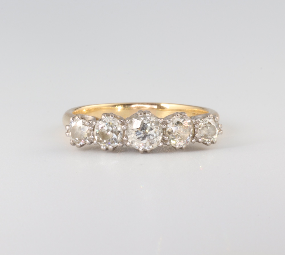 A yellow metal 18ct 5 stone diamond ring size O 1/2, approx 1.2ct, 4.2 grams