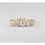 A yellow metal 18ct 5 stone diamond ring size O 1/2, approx 1.2ct, 4.2 grams