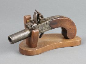 Coee of Devizes, a 19th Century box lock flintlock pocket pistol with 4cm screw off barrel and