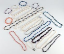 A quantity of cultured and coloured pearl necklaces