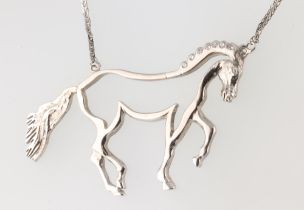 A 9ct white gold chain 36cm and a white metal diamond set horse pendant, the 7 diamonds each approx.