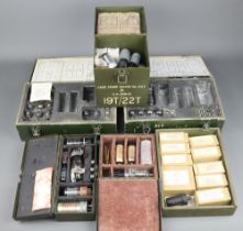 Various WWII military radio spare valve boxes, some with valves and other parts