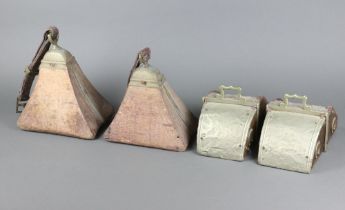 Two Eastern wooden and metal mounted triangular shaped stirrups 21cm x 23cm x 15cm and a ditto