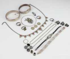 A silver buckle bracelet, 2 silver bangles and minor silver jewellery