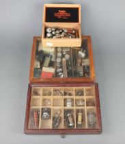 Two display units containing fuses, crystals, German WWII valves, Univac miniature valves and neon