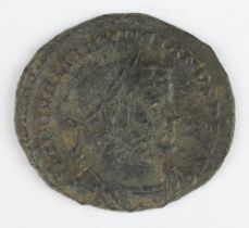 A Roman copper As coin for Maximises 235-38AD, the reverse shows Hercules