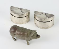 A pair of silver pill boxes London 1981 3cm, 43.4 grams, together with a metal vesta in the form