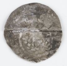 A silver short cross penny of Henry III, 1216-47, London Mint, the coin has been bent and