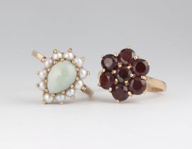 A 9ct yellow gold pearl and hardstone pear shaped ring, a ditto garnet ring sizes O and O 1/2, 8