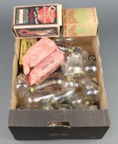 A collection of vintage light bulbs including a neon OSGLIM Beehive and a similar boxed MAZDA