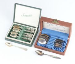 A set of 6 Continental white metal filigree coffee spoons, boxed, 57 grams, cased set of plated