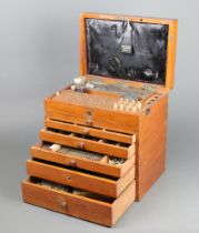 The Dental Manufacturing Company Ltd, a dental chest with hinged lid fitted 6 short drawers