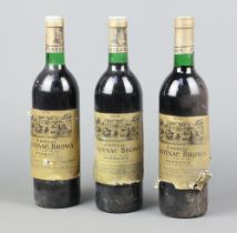 Three bottles of 1974 Chateau Centenac Brown, Cru Classe Margaux red wine Two labels are loose and