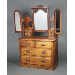 A Victorian mahogany dressing chest with triple plate mirror fitted 4 glove drawers above 2 short