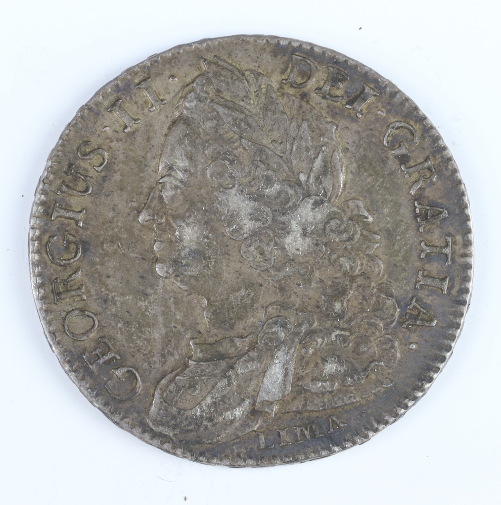 A silver half crown of George II 1745, LIMA below but, year of reign DECIMO NONO, silver milled