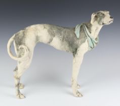 An Ostinilli and Priest ceramic figure of a standing hound 39cm, with original price tag