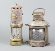 An E Thomas and Williams Aberdare miner's safety lamp together with an Overtarting pattern 4895