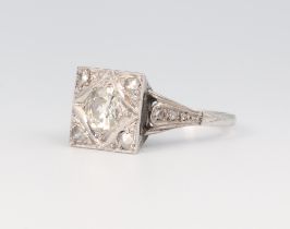 A white metal 18ct and plat. Art Deco diamond cocktail ring, the mine cut centre stone 0.75ct,