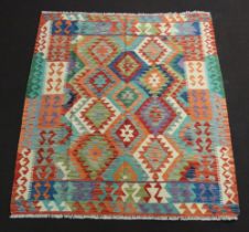 An orange, blue and turquoise ground Chobi Kilim rug with all geometric design 185cm x 153cm