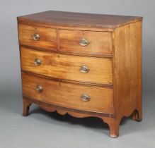 A 19th Century crossbanded mahogany bow front chest of 2 short and 3 long drawers with replacement