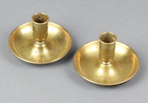 A pair of 19th Century brass campaign candlesticks with leather bases 5cm x 7cm