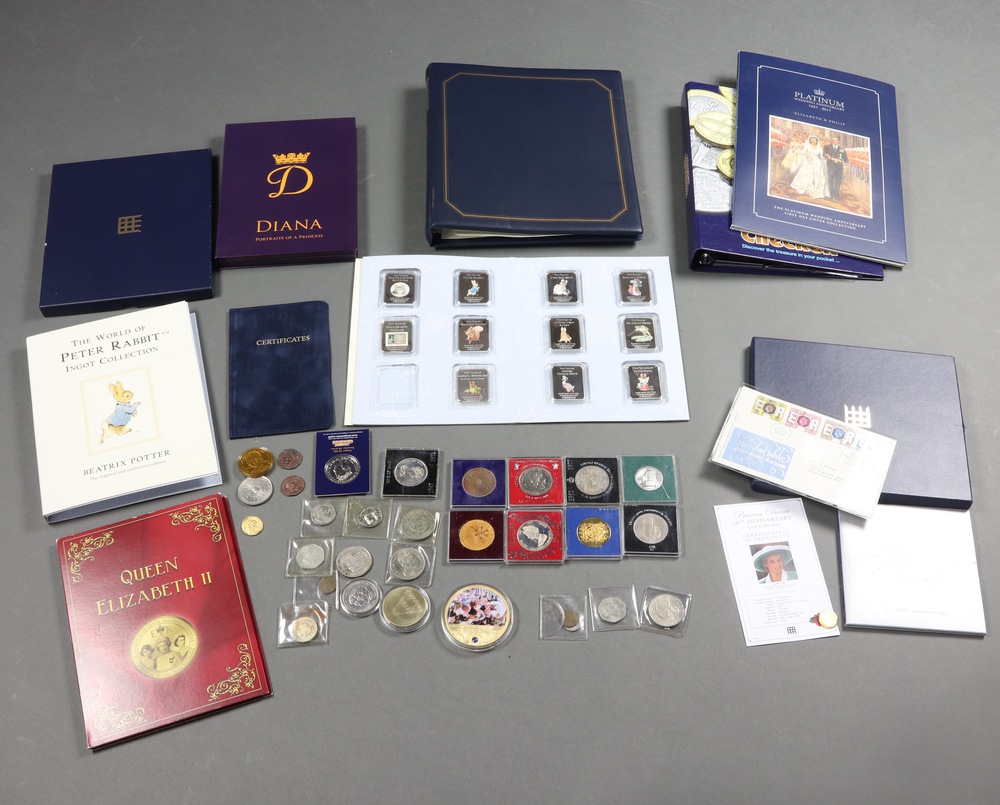 A quantity of commemorative crowns and coins