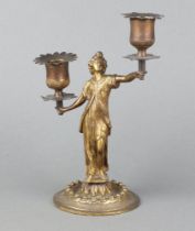 A 19th/20th Century gilt metal twin light candelabrum with detachable sconces, the support in the