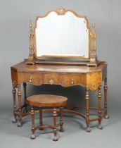 A 1930's Italian style walnut dressing table fitted a drawer, raised on cup and cover supports