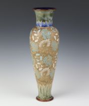 A Doulton Slater oviform vase with elongated neck decorated with flowers 43cm