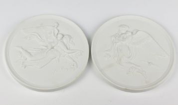 Two Royal Copenhagen plaques decorated with classical figures, bisque white, 15cm