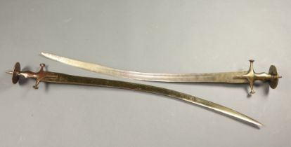 Two reproduction gilt metal Talwar swords with 87cm blades Some light rust in places