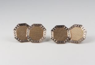 A pair of yellow and white metal 9ct and 18ct octagonal cufflinks 5.1 grams